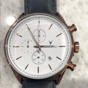 Rose gold color chronograph by Vincero with soft gray leather strap.